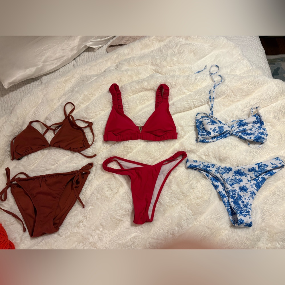 Never worn bikini sets- not $100 read description
